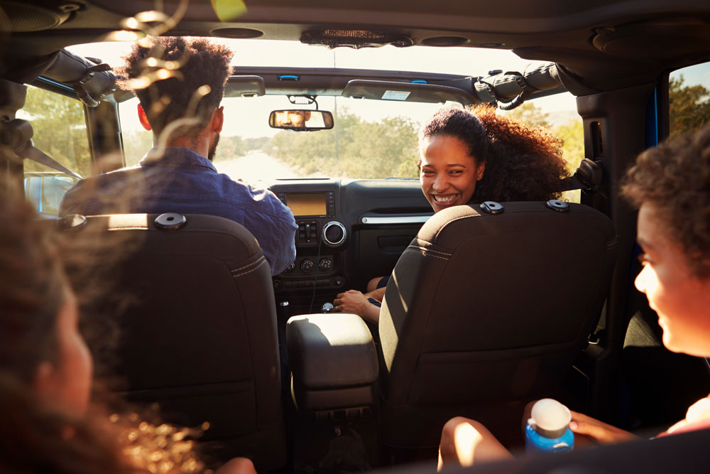 group of people in a car